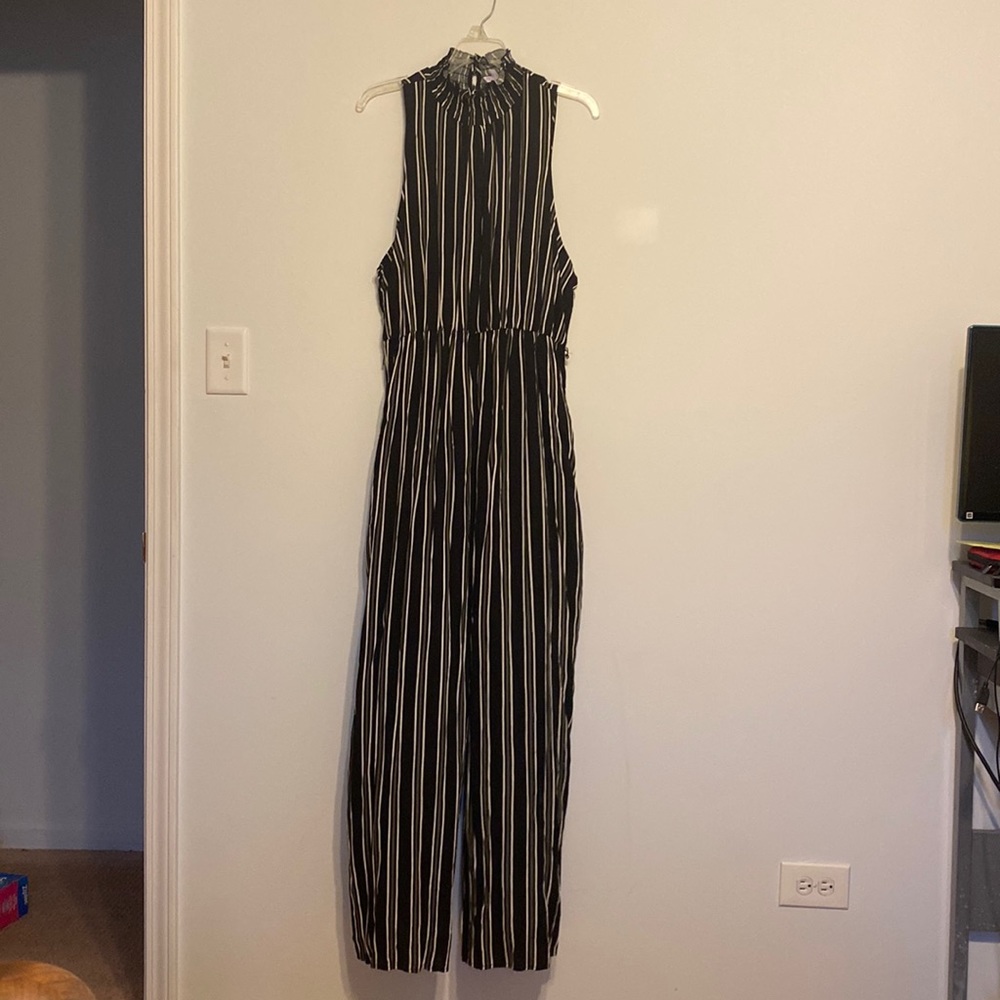 Black and white striped jumpsuit with open back